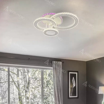 Lampadario LED con telecomando e cristallo LEOCADIA RGB 134W, 3 Cerchi, Luce Fredda/Calda/Neutra, Dimmerabile, Lampadario LED Cristallo Bianco Titolo predefinito Alessandro Design